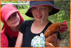 Children with the school chicken